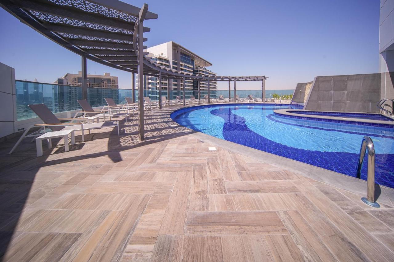 Elegant 2Br View With Rooftop Pool The Bay ดูไบ ภายนอก รูปภาพ